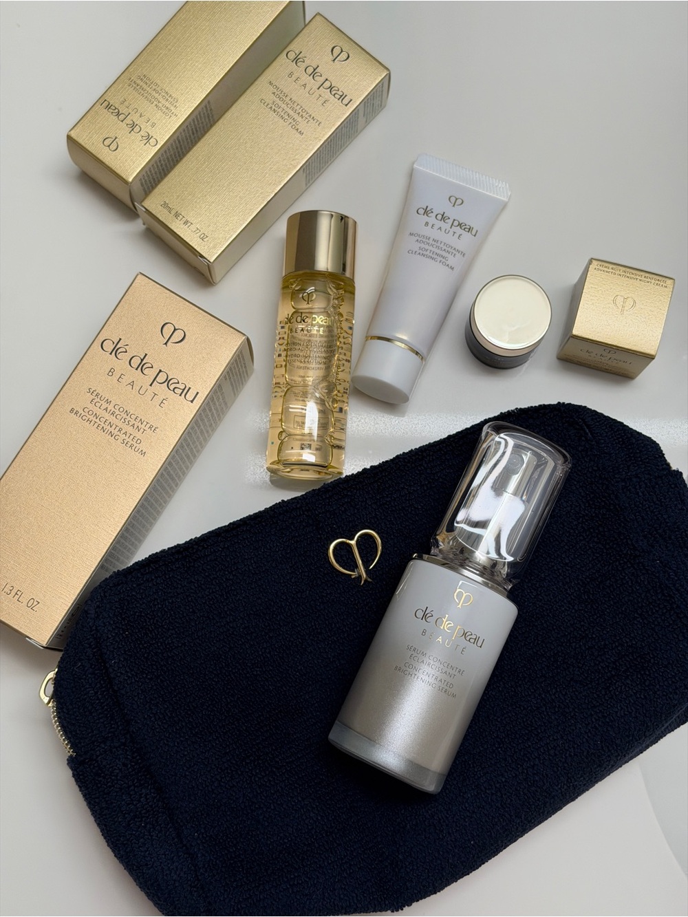 Cle de Peau CONCENTRATED BRIGHTENING SERUM plus travel size products and bag - Picture 3 of 12